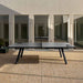 RS Barcelona You and Me monochrome ping pong table in white showing underside storage, contemporary outdoor table tennis table with built-in ball and paddle storage.