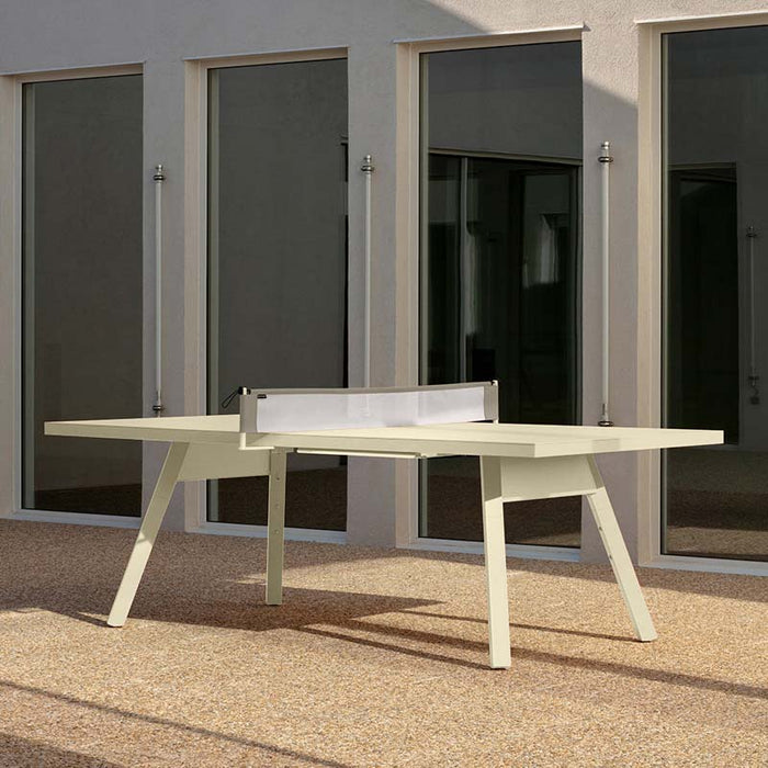 RS Barcelona You and Me monochrome ping pong table in vibrant red with integrated net, modern outdoor table tennis table in clean architectural environment.