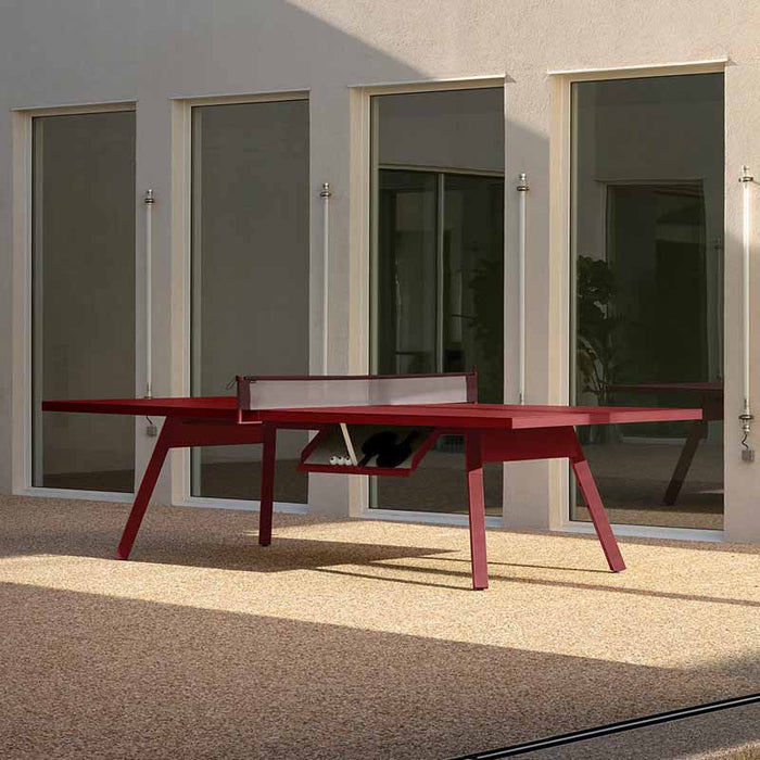 RS Barcelona You and Me monochrome ping pong table in orange with underside storage, modern outdoor table tennis table featuring built-in ball storage and sleek design.