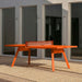 RS Barcelona You and Me monochrome ping pong table in muted green finish with net, modern outdoor table tennis table with sleek legs and architectural surroundings.