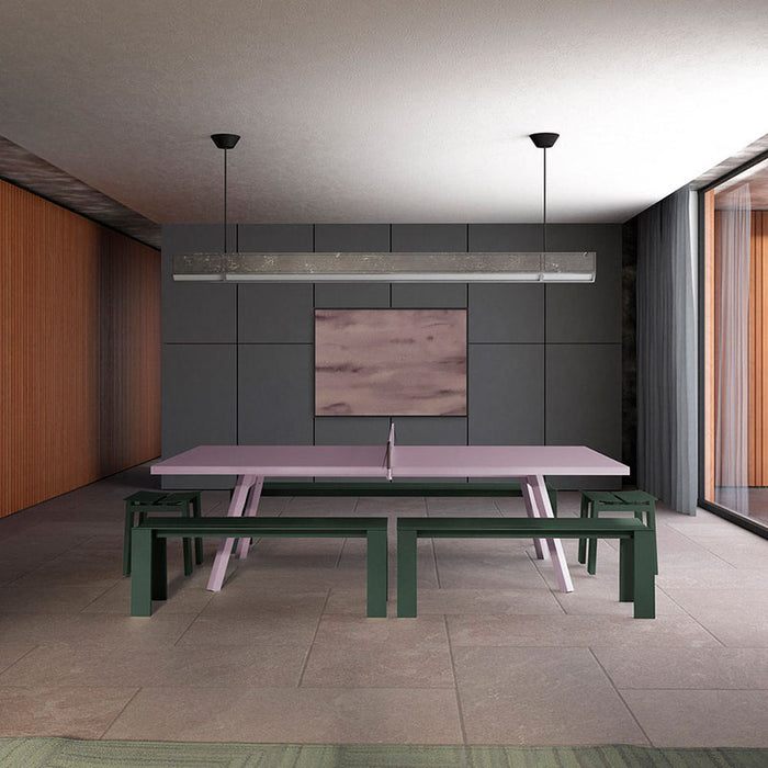 RS Barcelona You and Me monochrome ping pong table in blue with matching benches, modern outdoor table tennis table in stylish architectural setting with wooden facade.