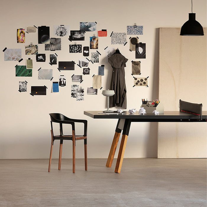 Minimalist workspace with RS Barcelona You and Me ping pong table in black, multifunctional table tennis desk with wooden legs in creative studio setting