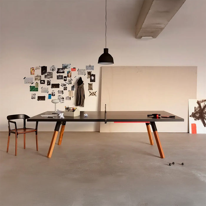 Modern interior with RS Barcelona You and Me ping pong table in white and black, sleek table tennis table with integrated storage and wooden legs
