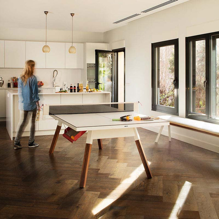 Bright kitchen space with RS Barcelona You and Me ping pong table in white, multifunctional dining and table tennis table with wooden legs