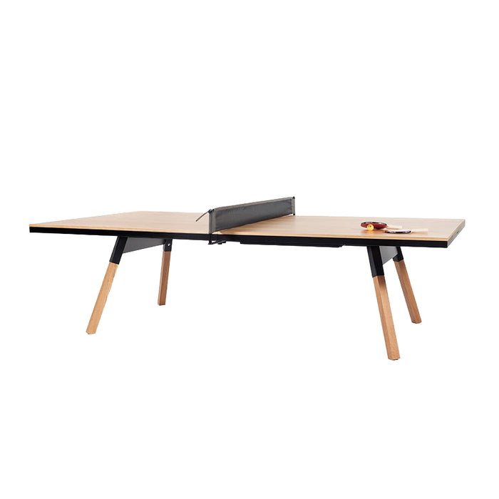RS Barcelona You and Me ping pong table with natural wood top and black frame, modern table tennis table with wooden legs and net in minimalist studio setting