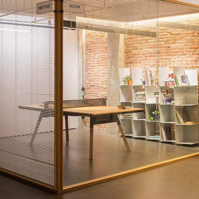Meeting room with RS Barcelona You and Me ping pong table in wood finish, multifunctional table tennis table in glass-walled office space