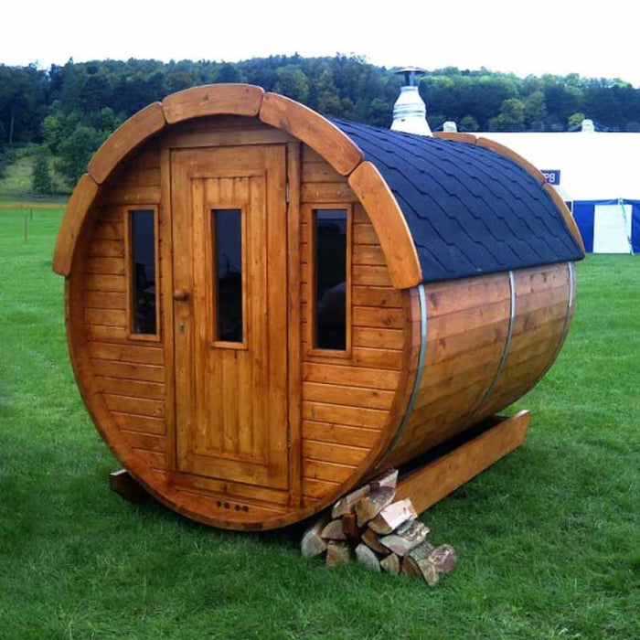 Sauna Barrel from Thermowood 1.9 x 2m on meadow.