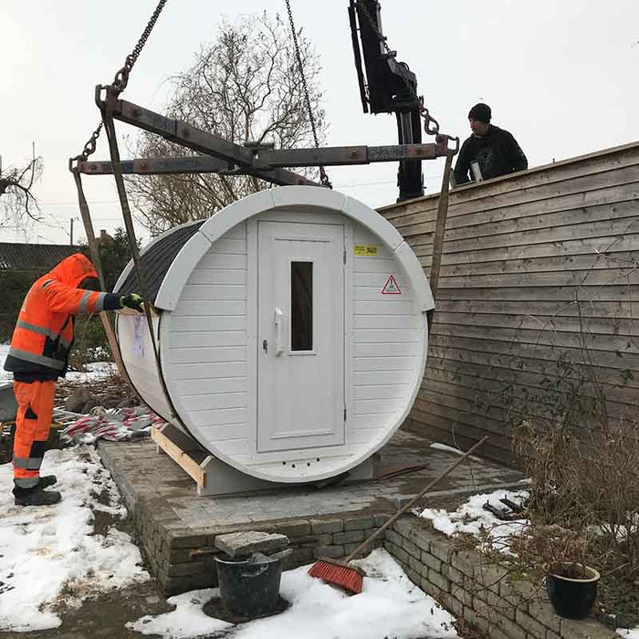 Sauna Barrel from Thermowood placed on the ground.