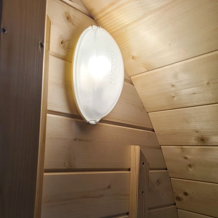 Close-up view of light in Sauna Barrel from Thermowood.