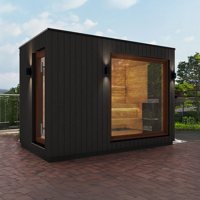 Angled view of the Saunum AirCube Double Outdoor Sauna with Changing Room, highlighting the sauna’s minimalist black finish and large, clear glass windows.