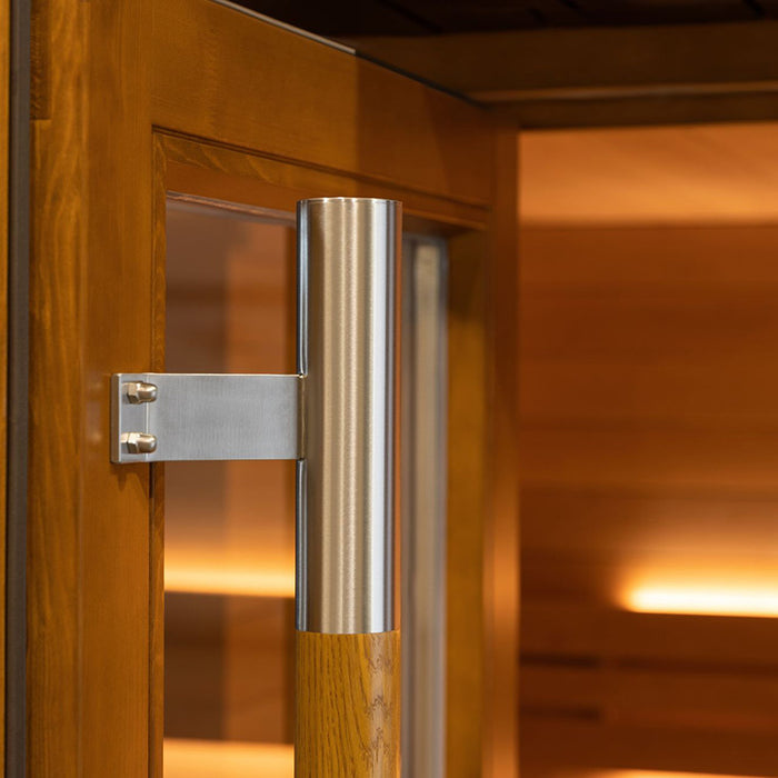 Polished wooden and stainless steel door handle of the Saunum AirCube One Outdoor Sauna, adding a touch of sophistication to the design.