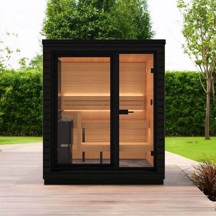 Saunum Classic Mini-Mini Outdoor Sauna set in an outdoor garden, featuring a sleek black Thermo-Spruce exterior and large glass panels, perfect for 2-3 people to relax and enjoy a serene sauna experience.