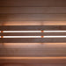 A close-up of the wall detail inside the Saunum Classic Mini Outdoor Sauna, showing the elegant wood cladding and soft lighting, creating a serene environment.