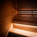 Detailed view of the upper and lower benches in the Saunum Classic Mini Outdoor Sauna, featuring Thermo-Aspen wood and soft LED lighting underneath for a comfortable seating area.