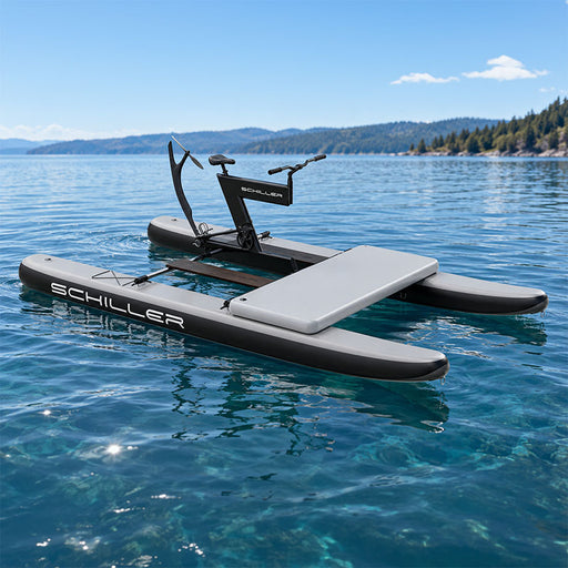 Schiller S1-C Water Bike floating on a calm lake with a mountain view.