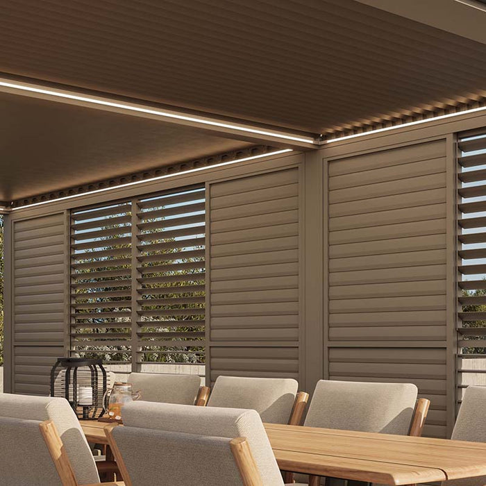 Interior view of the Suns Lifestyle Luxe Electric Louvered Pergola with integrated LED lighting, highlighting its modern design and evening ambiance.