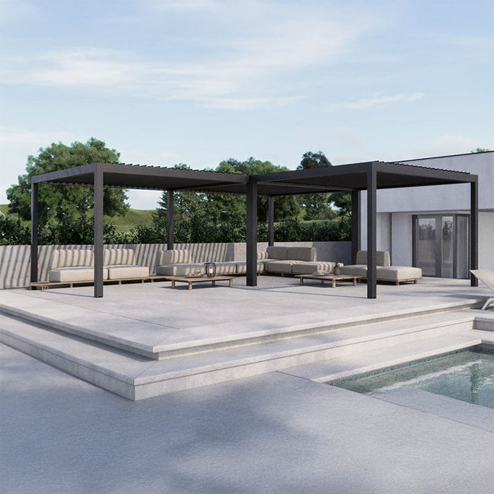 Modern Suns Lifestyle Luxe Electric Louvered Pergola in black, featuring a spacious dual-zone design with sleek outdoor seating by a poolside patio – perfect for luxury garden living.