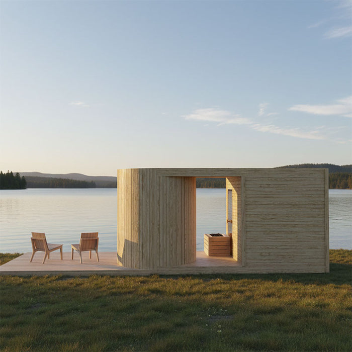 Modern Tauras Modular Air 7-person outdoor sauna cabin with curved wooden design, set on a lakeside deck with scenic water views and natural surroundings. Ideal luxury garden sauna or lakeside retreat.