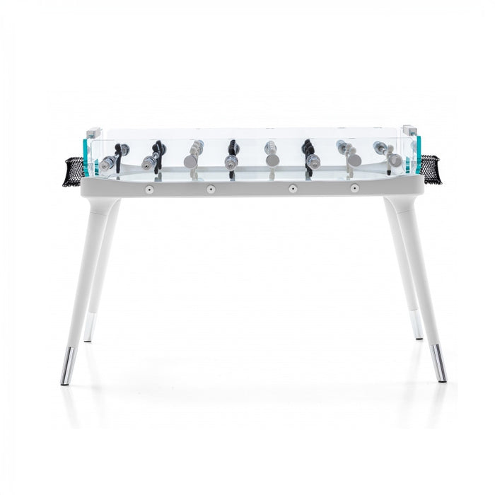 This side perspective captures the refined aesthetics of the foosball table with its clear playing surface, modern white frame, and distinctive player rods. The stylish netting adds a final touch.