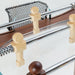 Close-up of the handcrafted walnut and ash wood players on the Teckell 90 Minuto Wood Foosball Table - III Noce Italiano.