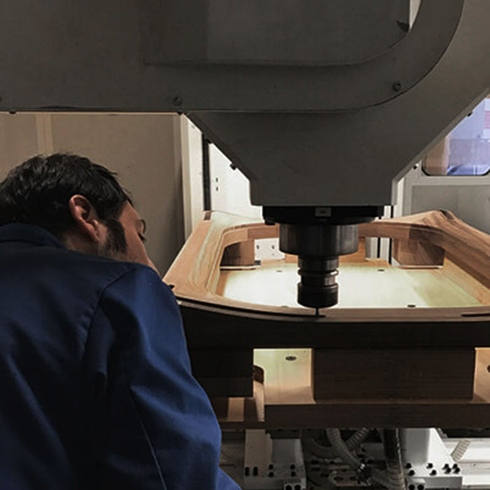 Manufacturing process of the Teckell 90 Minuto foosball table, focusing on the craftsmanship involved.