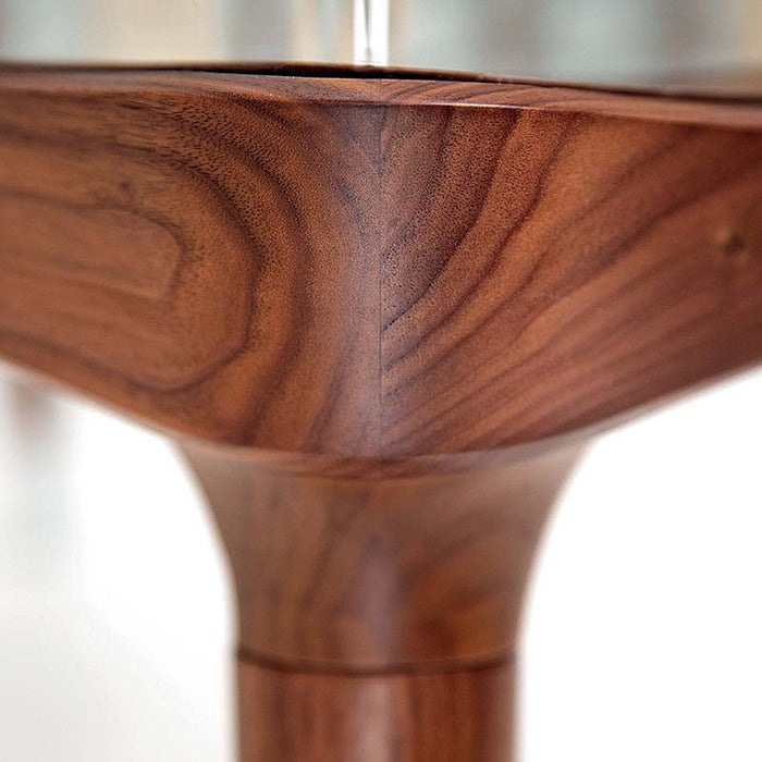 Detailed view of the corner joint on the Teckell 90 Minuto foosball table, showcasing its walnut wood construction.