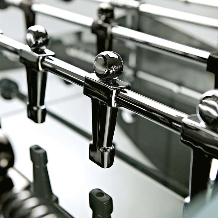 Detailed view of the anodised aluminium players, highlighting the craftsmanship of the Teckell Cristallino Black Foosball Table.