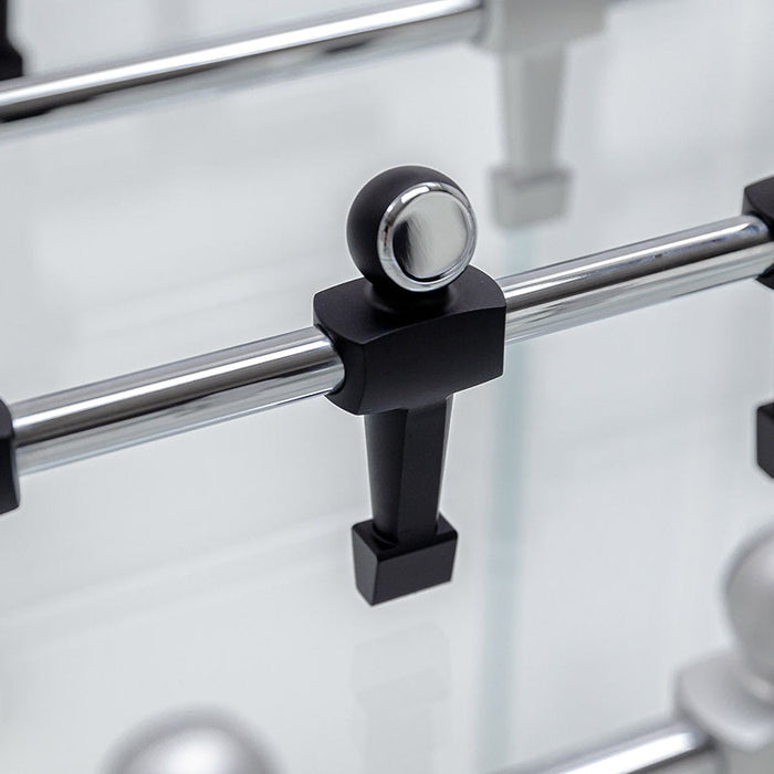 Detailed view of a black player figure on the Teckell's Classic Foosball Table, highlighting its sleek design.