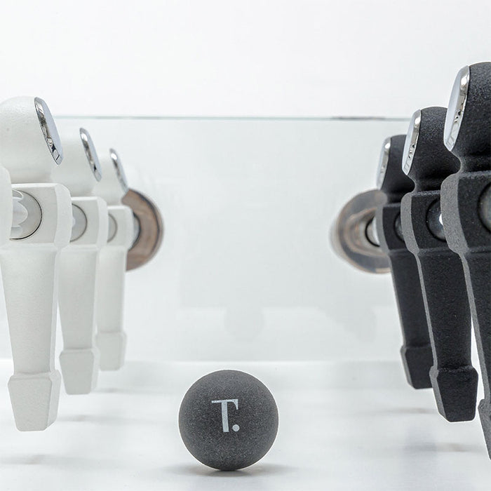 Close-up view of the Teckell Fuoriclasse Foosball Table's players and ball, highlighting the detailed craftsmanship.