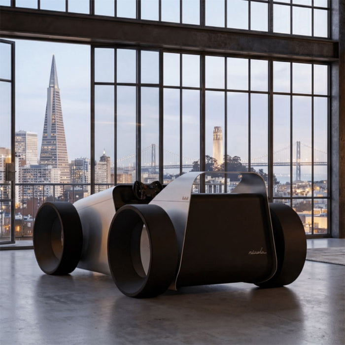 Teckell Nivola Racing Simulator positioned in a luxury apartment overlooking a city skyline during daylight.