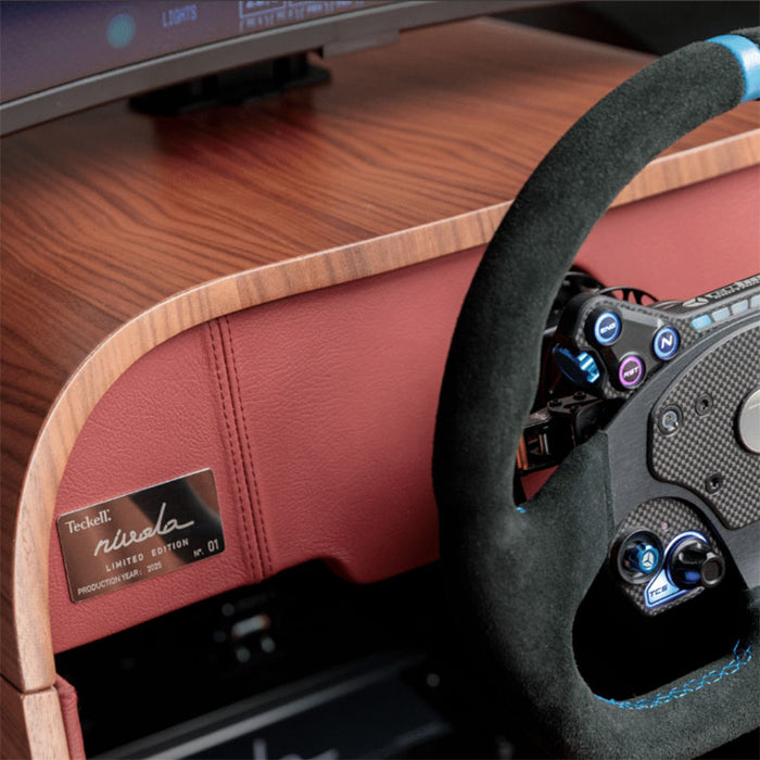 Detailed view of the Teckell Nivola Racing Simulator dashboard, leather trim and professional racing steering wheel.