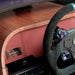 Detailed view of the Teckell Nivola Racing Simulator dashboard, leather trim and professional racing steering wheel.