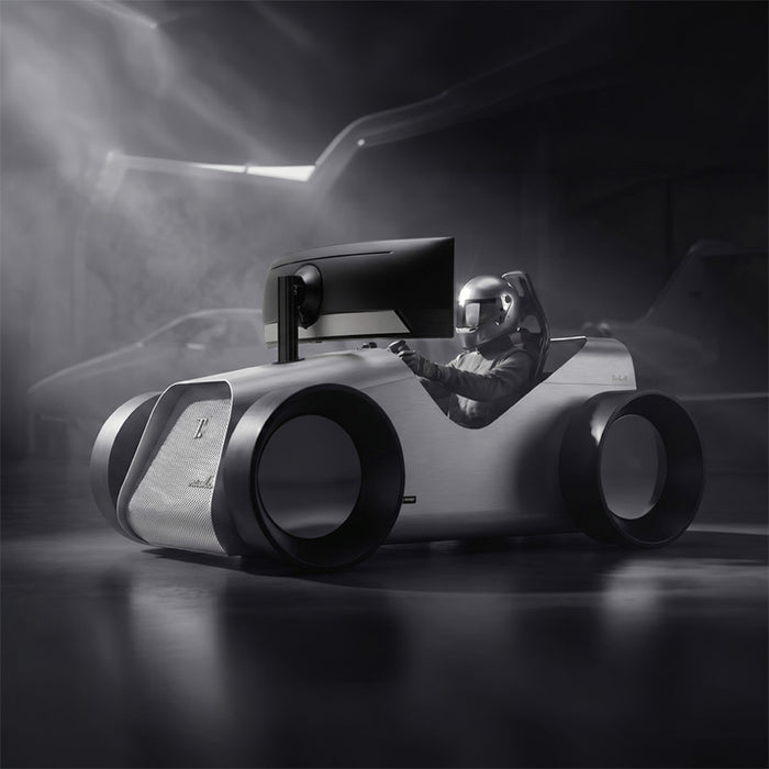 Teckell Nivola Racing Simulator with driver wearing racing helmet, demonstrating an immersive luxury sim racing experience.