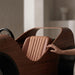 Luxury upholstered racing seat inside the Teckell Nivola Racing Simulator with elegant walnut frame and handcrafted finish.