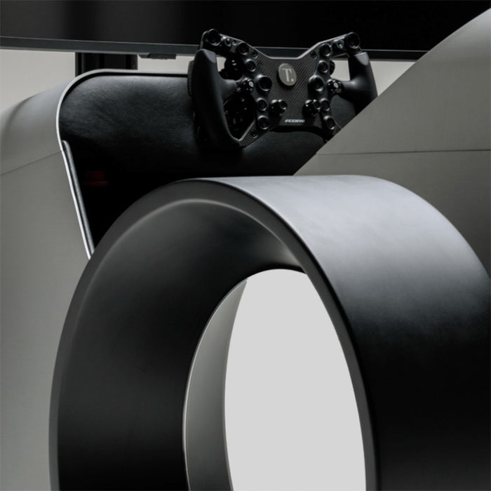 Rear section of the Teckell Nivola Racing Simulator highlighting oversized wheel design and premium racing controls.
