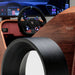 Front cockpit detail of the Teckell Nivola Racing Simulator with walnut finish, racing wheel and curved gaming monitor.