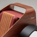 Close-up of the Teckell Nivola Racing Simulator featuring handcrafted walnut bodywork and premium upholstered racing seat.