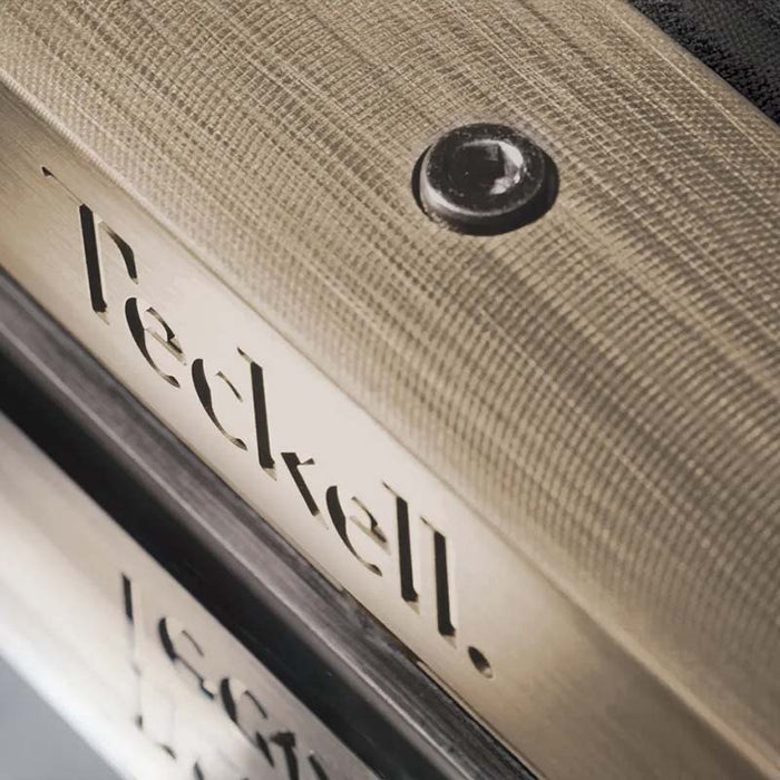 Close-up of the edge of the Teckell T1.1 Light Bronze Pool Table, displaying the textured bronze finish and glass integration.