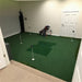 True Strike golf mat set for putting practice in a room.