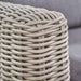 A close-up of the armrest, displaying the intricate rattan weave and smooth finish of the Tuscany Outdoor Corner Seating Set.