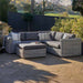 Tuscany Outdoor Corner Seating Set arranged in a garden setting.