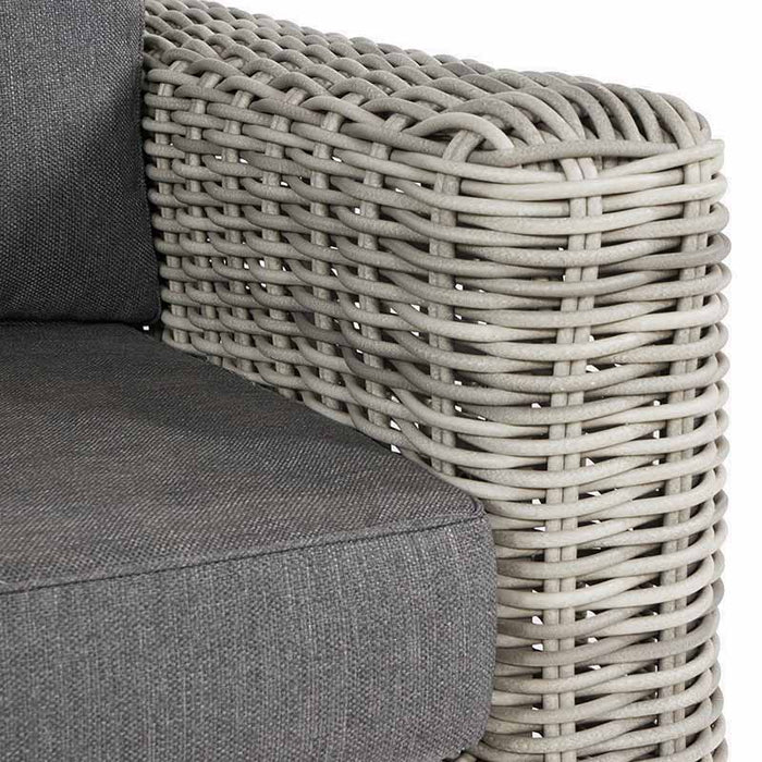 Close-up of the armrest on the Tuscany Outdoor Seating Set, showcasing the intricate grey rattan weave and sturdy construction for long-lasting use.