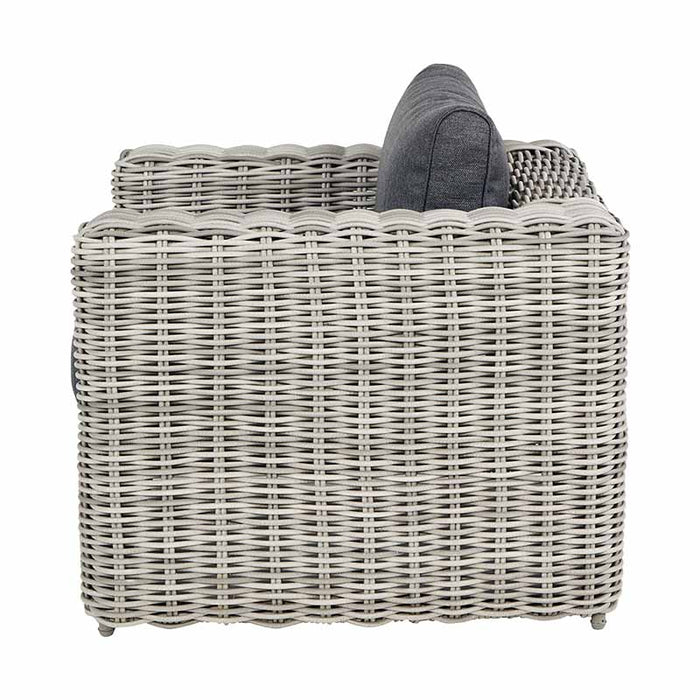 Side view of the armchair from the Tuscany Outdoor Seating Set, highlighting the detailed rattan weave and robust construction.