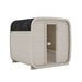 Ula Classic 6-person outdoor sauna with whitewashed exterior and black shingle roof, blending modern design with traditional sauna comfort.