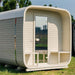 Front view of the Ula Grand 6-Person Outdoor Sauna in Beige finish with glass door and covered porch seating