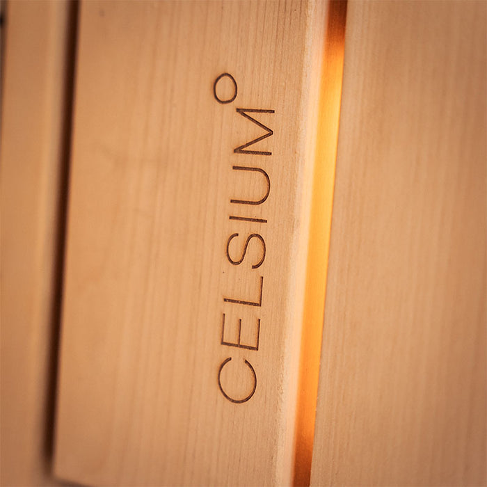 Close-up of CELSIUM logo engraved on the interior timber of the Ula Grand 6-person outdoor sauna.
