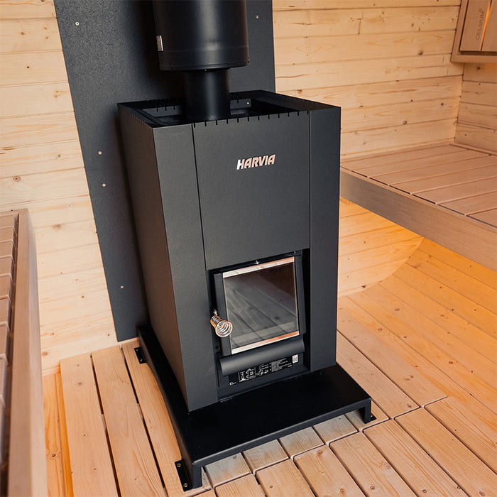 Close-up of Harvia wood-burning sauna stove inside the Ula Grand 6-person outdoor sauna.