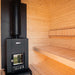 Interior of the Ula Grand 6-person outdoor sauna with Harvia wood-burning heater and wooden bench seating.