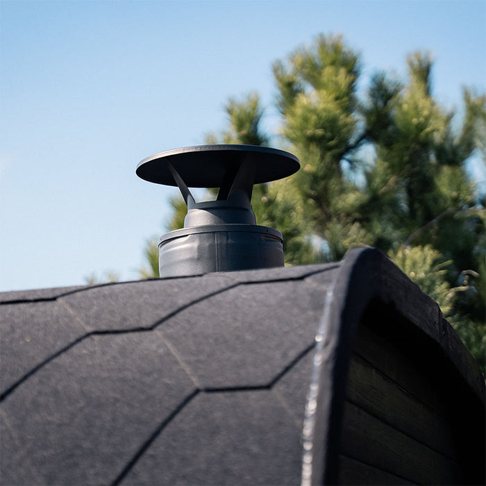 Close-up of the chimney on the roof of the Ula Grand 6-person outdoor sauna.
