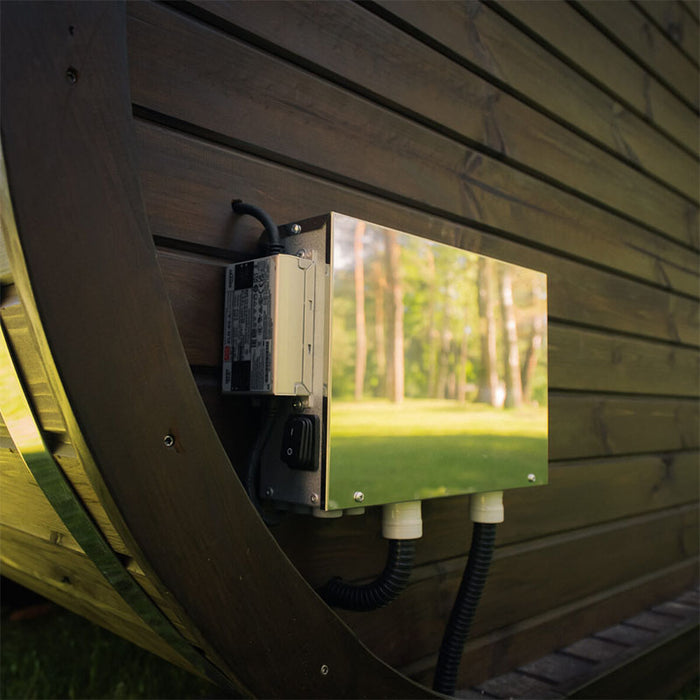 Close-up of the electrical connection box on the Ula Mini 2-person outdoor sauna, showing modern outdoor wiring setup.